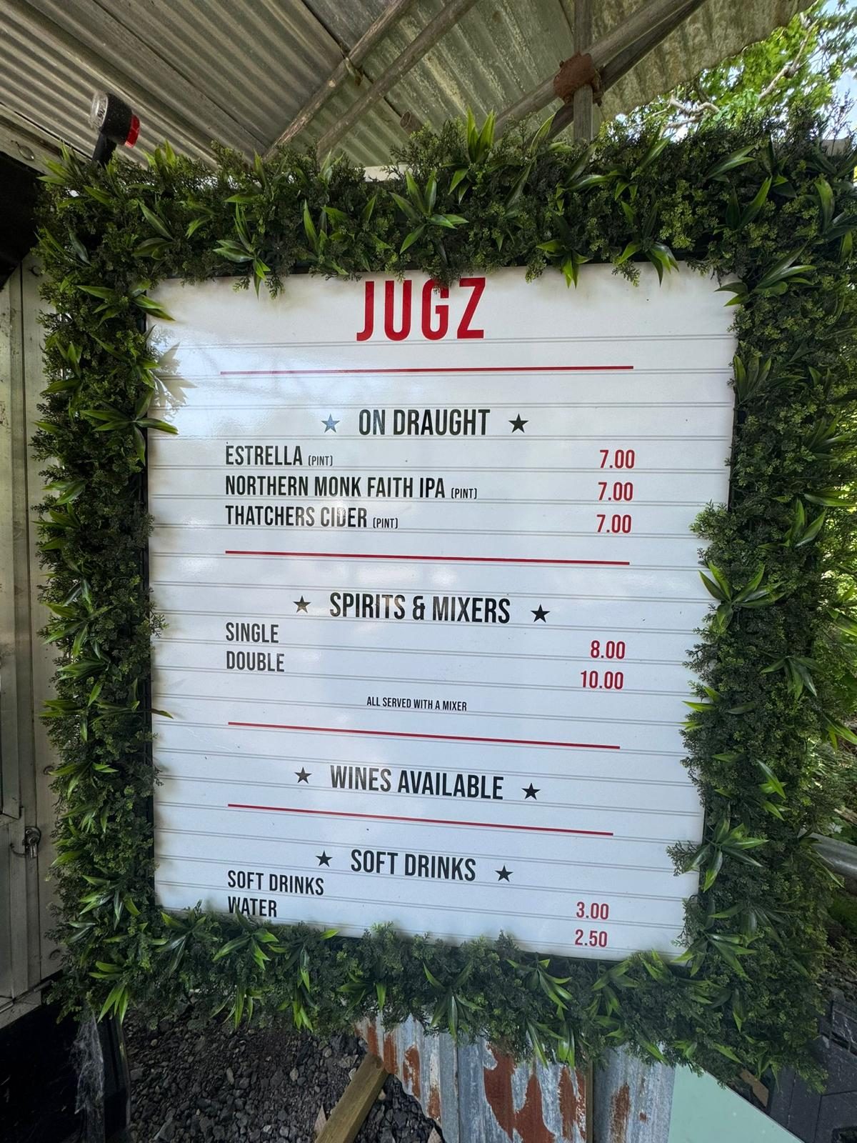 Jugz Mobile Bar drinks menu board listing cocktails and draught prices